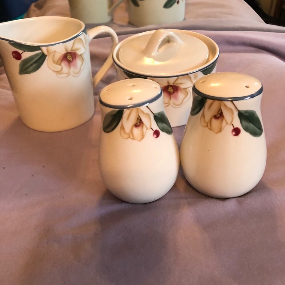 Four piece set cream , sugar ,salt and pepper